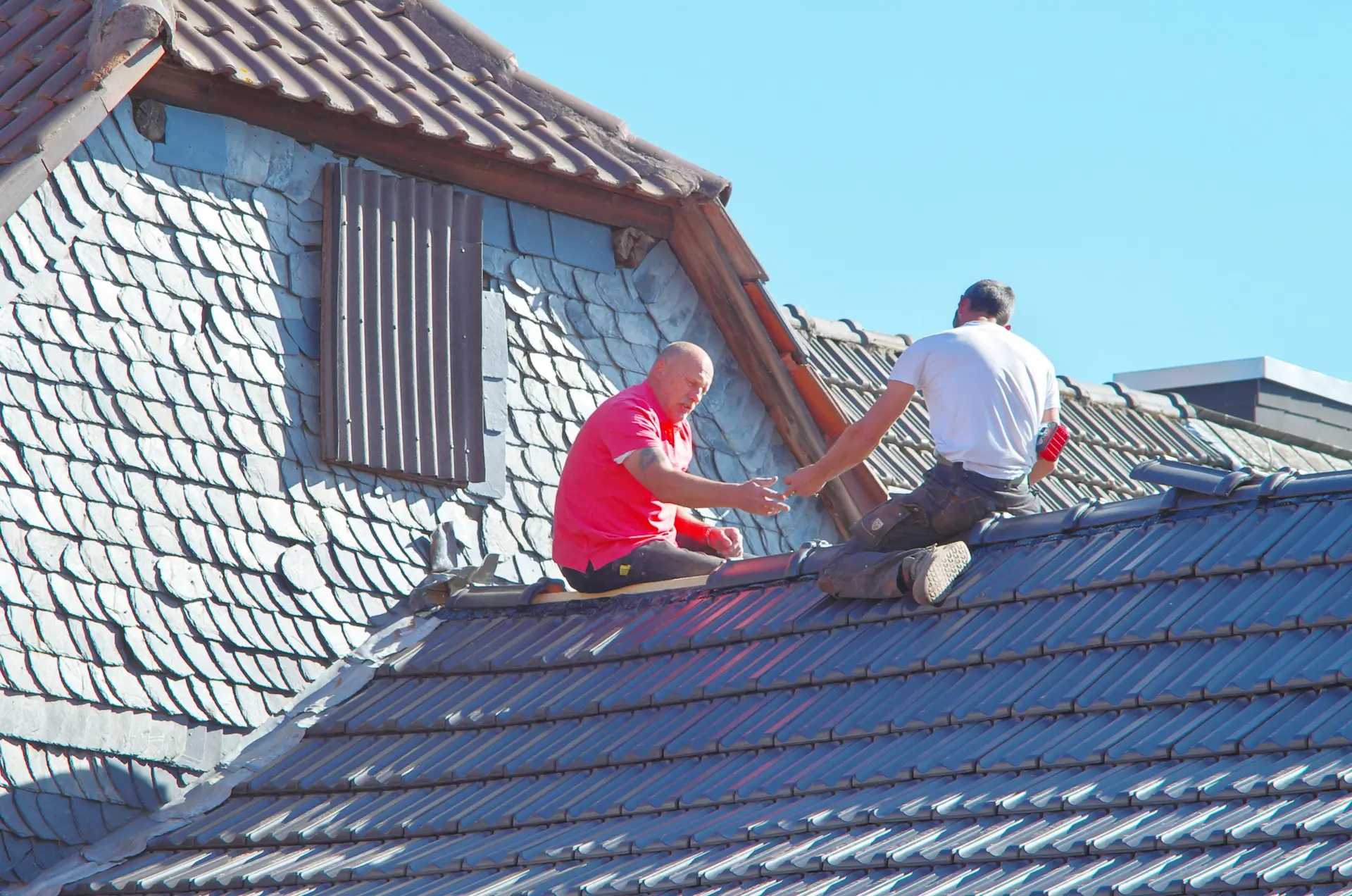 team doing roof maintenance