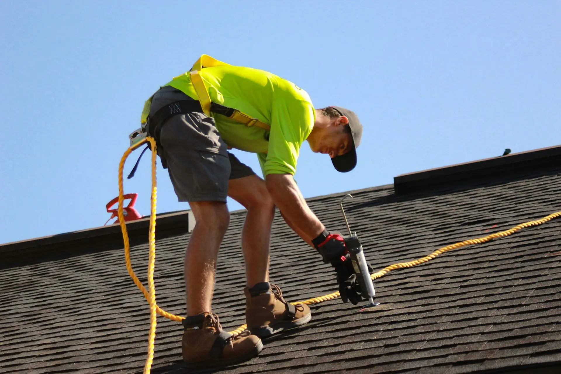 roof being repaired by worker form ERB London